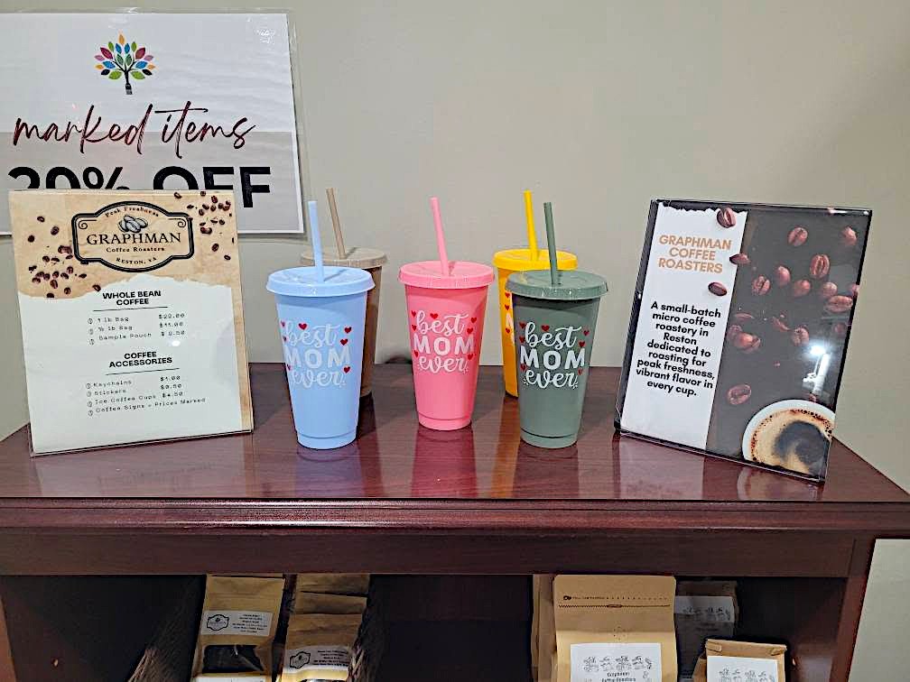 Graphman Coffee Roasters retail table with pricing and bags